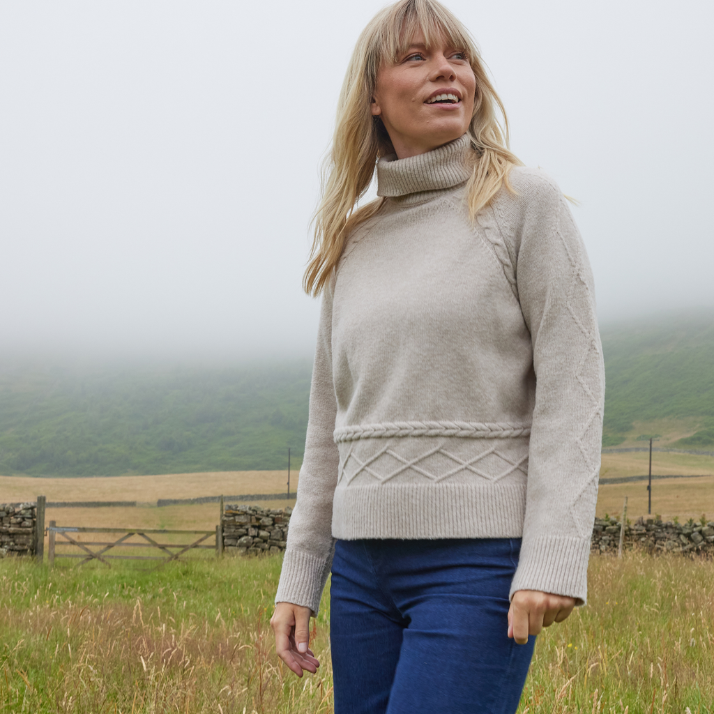 Serena Womens Cable Knit Roll Neck Jumper - Light Beige Melange - Image 2